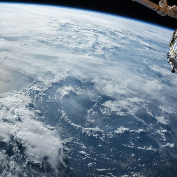 view of Earth and satellite