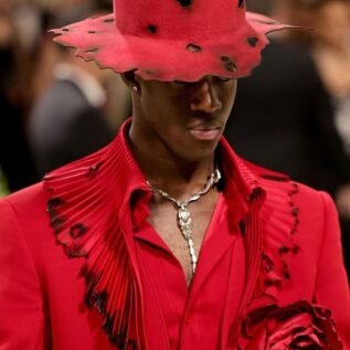 alt="Wisdom Kaye IMG model runway shot"