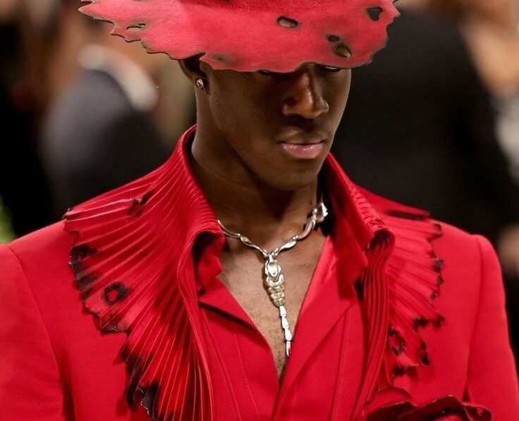 alt="Wisdom Kaye IMG model runway shot"