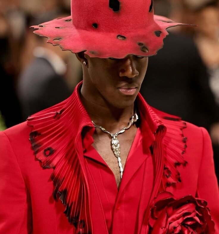 alt="Wisdom Kaye IMG model runway shot"
