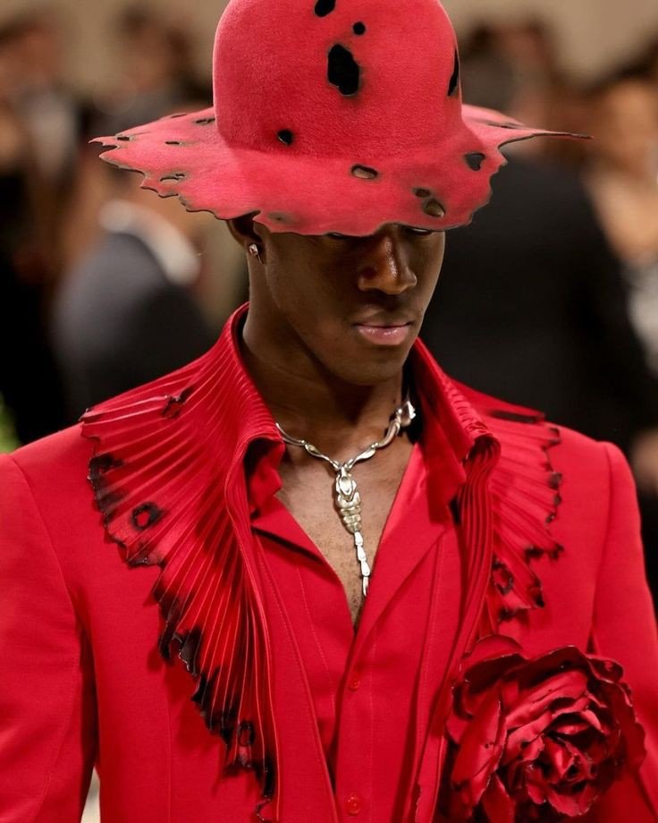 alt="Wisdom Kaye IMG model runway shot"