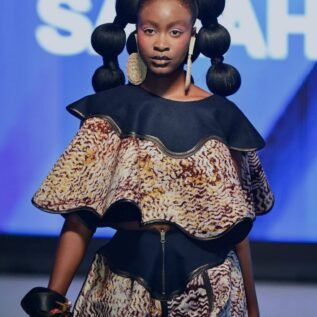 Designer Sarah Ajayi at African Fashion Week London 2025 runway