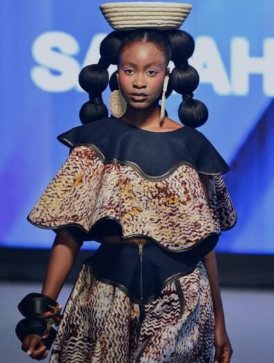 Designer Sarah Ajayi at African Fashion Week London 2025 runway